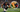 NFL athlete running with overlay of healthy foods like salmon, quinoa, avocado, and berries