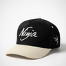 white and black embroidered snapback hat